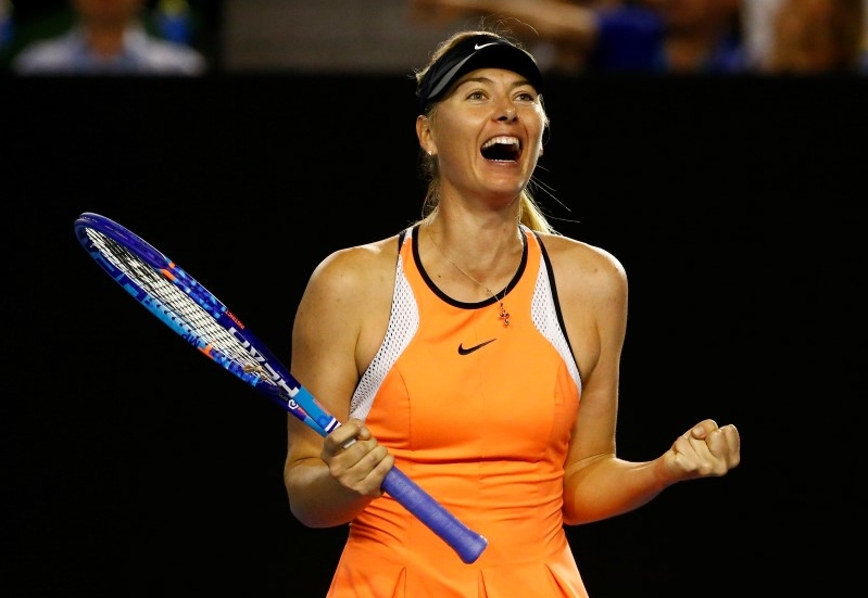 Russia's Sharapova celebrates after winning her fourth round match against Switzerland's Bencic at the Australian Open tennis tournament at Melbourne Park