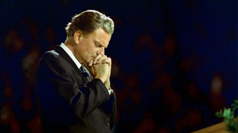 Billy Graham praying