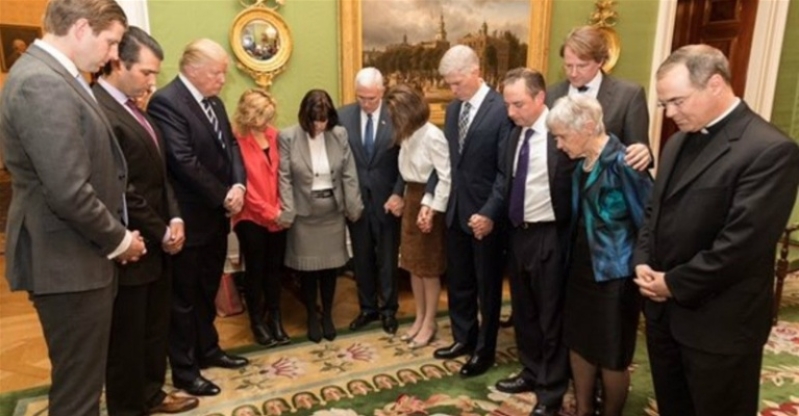 Gorsuch praying with Trump Pence