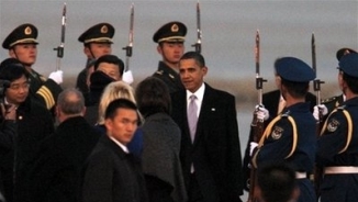 Freedom Fighters Press Obama as 1st Trip to China Kicks Off