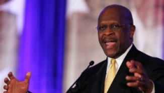 Herman Cain Says He's Rising Up, Doesn't Mind Contending