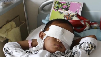 Woman Who Gouged Out Eyes of Chinese Boy Sought