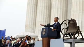 On Day of Hope and Celebration, Obama Leaves Himself on the Sidelines