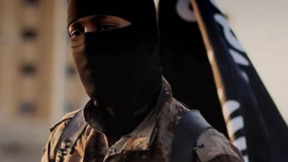 FBI Seeks Public’s Help in Identifying Masked American ISIS Jihadist in Video