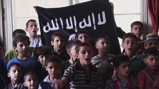 ISIS Indoctrinates and Exploits Children with Violence; Boy With Suicide Belt Turns Himself In