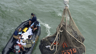 AirAsia Flight QZ8501: Indonesian Officials Suspended, Search Continues for Black Boxes