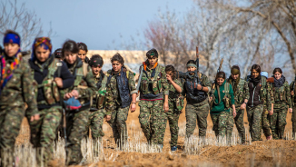 Kurdish Forces Reclaim Kobani from ISIS, Erect Flag on Hill Where Heroic Female Fighter Died 