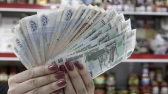 Russian Central Bank Lowers Interest Rate as Fear Mounts over Recession Caused by Oil Prices, Western Sanctions