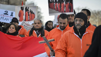 Coptic Christians Protest Outside White House Wearing Orange Jumpsuits, Hoping For Aggressive US Response