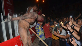 Thousands of Protesters in India Drag Accused Rapist From Prison for Public Torture and Death