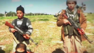 ISIS Beheads Eight Men Who Were Led to Their Deaths By Young Boys in Horrific New Video