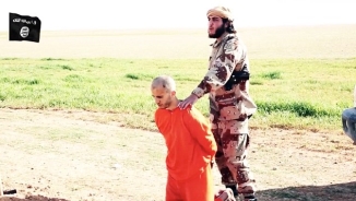 Shocking ISIS Video Shows Man Digging His Own Grave Before Being Executed by Jihadist Group