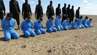 ISIS Violently Executes Nine Men, Including 15-Year-Old Boy, Accused of Homosexuality 