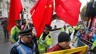 Chinese Dissidents Accuse UK Of 'Shameful' Clampdown On Xi Protests