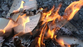 Video: ISIS Burning Hundreds of Christian Textbooks in Attempt To Erase Religion From Middle East 