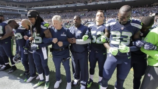 Russell Wilson, Seahawks Lock Arms in Show of Unity While Dolphins Kneel for National Anthem