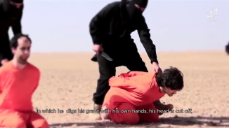 ISIS Decapitates Members of Free Syrian Army, Place Heads On Spears In New Propaganda Video 