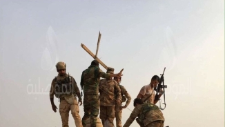 Christian Forces Triumphantly Erect Crosses Atop Churches Retaken From ISIS, Ring Church Bells 