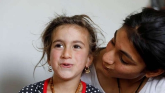 Iraqi Christian Family Thanks Jesus After 6 Y/O Daughter Returns from ISIS Captivity 